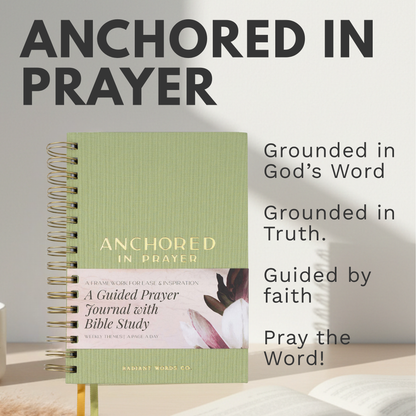Green prayer journal titled 'Anchored in Prayer' on a white surface with text about its features.